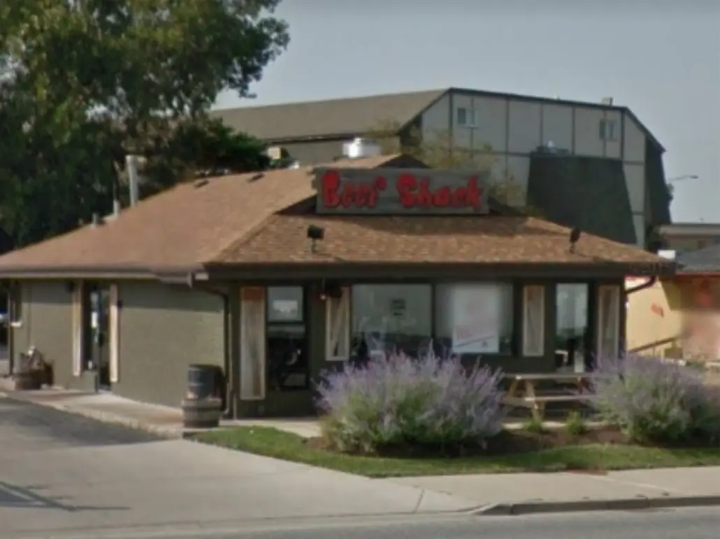 The original Beef Shack, a single-storey corner restaurant with a Beef Shack sign on the roof