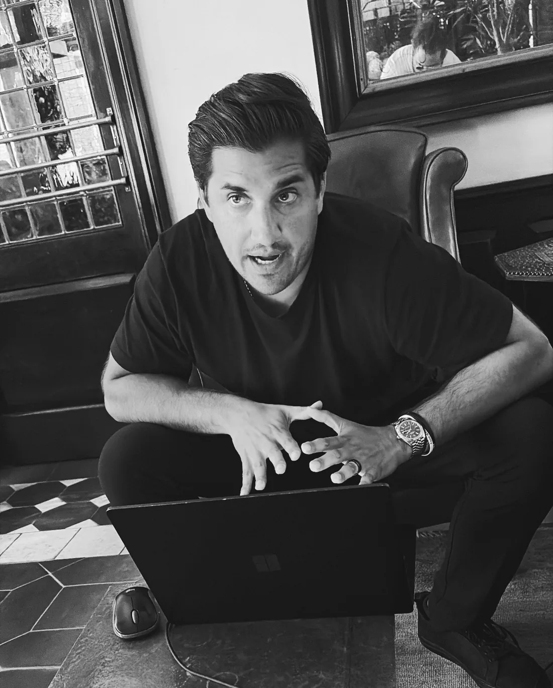 Spiro Douvris, founder of TROPHI, working on a client's delivery accounts